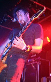 Трой Сандерс біографія, фото, розповіді - американський музикант, який понад усе відомий як басист і один із двох основних вокалістів грув-металевої групи Mastodon